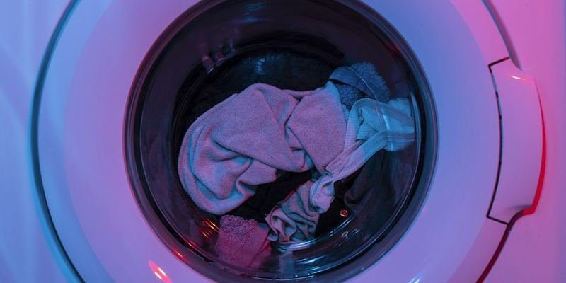 Close-up of a front-load laundry machine drum
